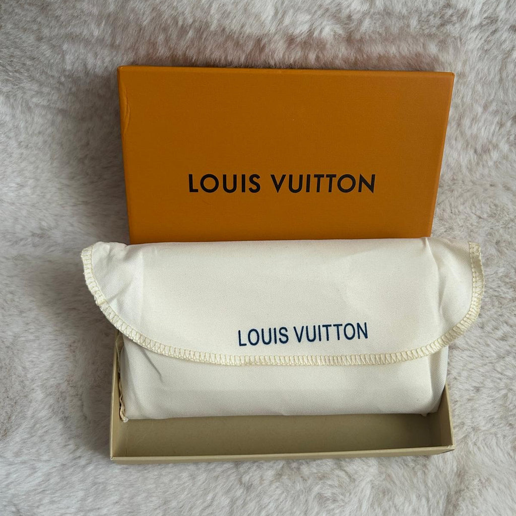 Pochette zippée monogramme fleuri beige et marron