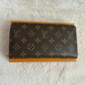 Pochette zippée monogramme fleuri beige et marron