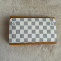 Pochette zippée blanche motif monogramme