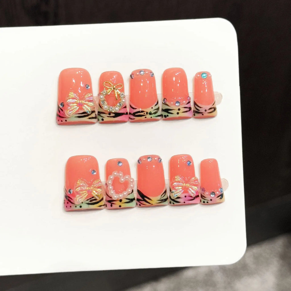 Faux ongles à pression Duck Moyen Orange Poudré Tigre Magique Nœud - Faits main (Lot de 10)