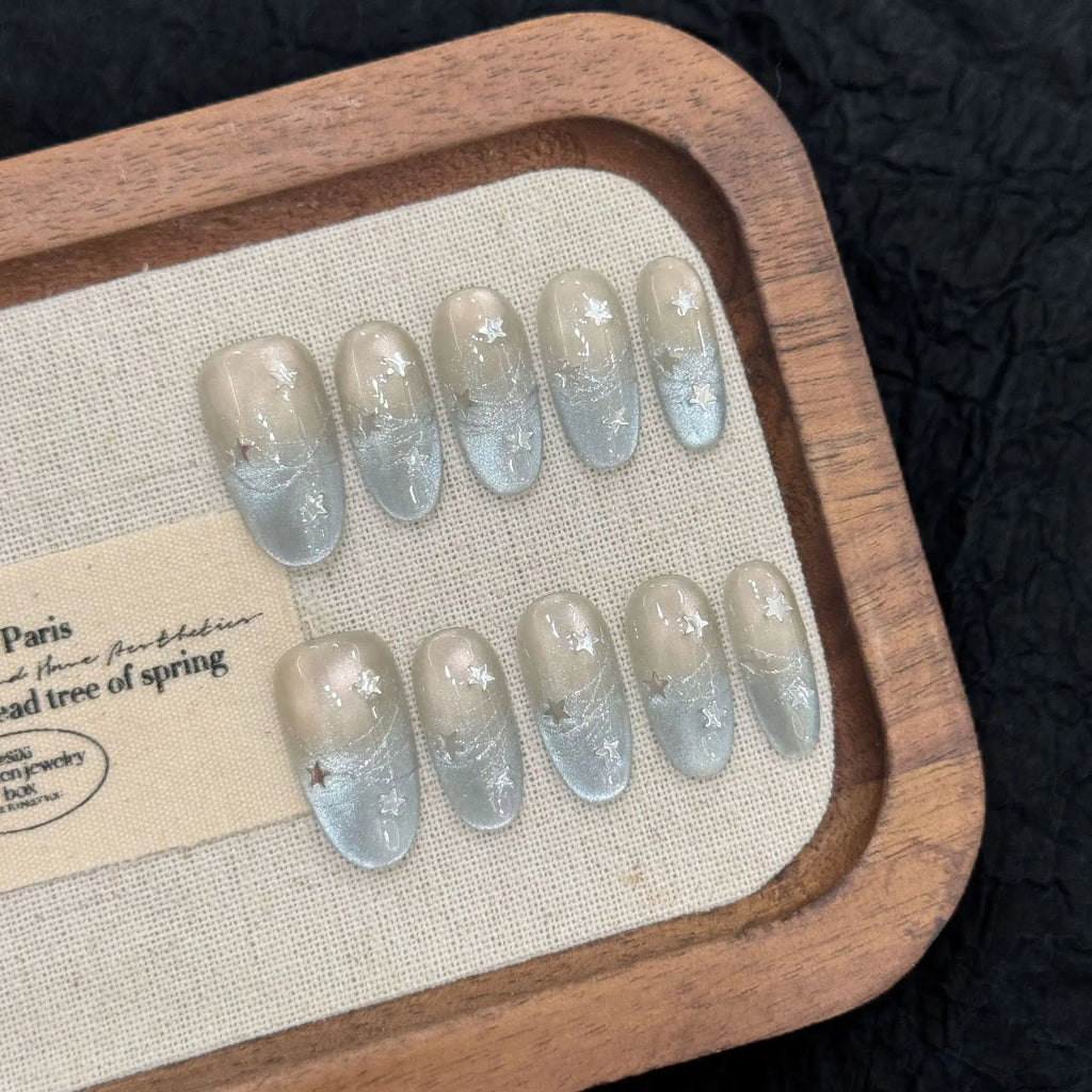 Faux ongles à pression Ovale Moyen Étoiles Œil de Chat Météore Froid - Faits main (Lot de 10)