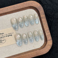 Faux ongles à pression Ovale Moyen Étoiles Œil de Chat Météore Froid - Faits main (Lot de 10)