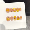Faux ongles à pression Rond Court Pomme Dessinée Main Feuilles d'Or Nœud - Faits main (Lot de 10)