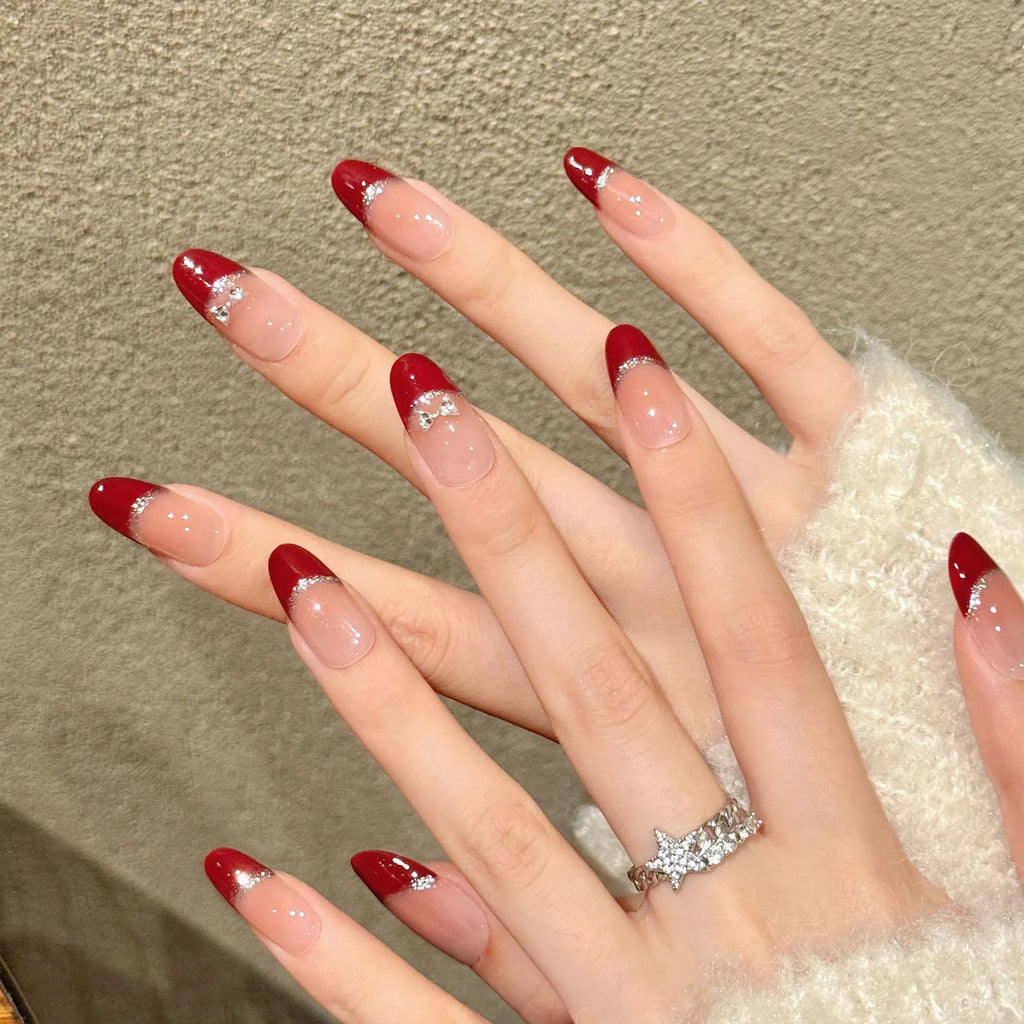Faux ongles à pression Ovale Court Rouge French Argentée Nœud - Faits main (Lot de 10)
