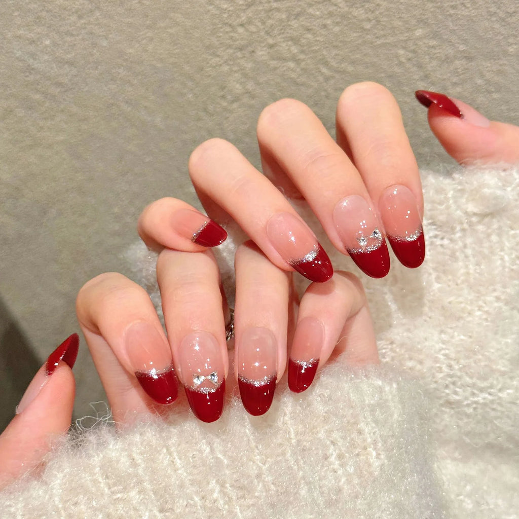 Faux ongles à pression Ovale Court Rouge French Argentée Nœud - Faits main (Lot de 10)