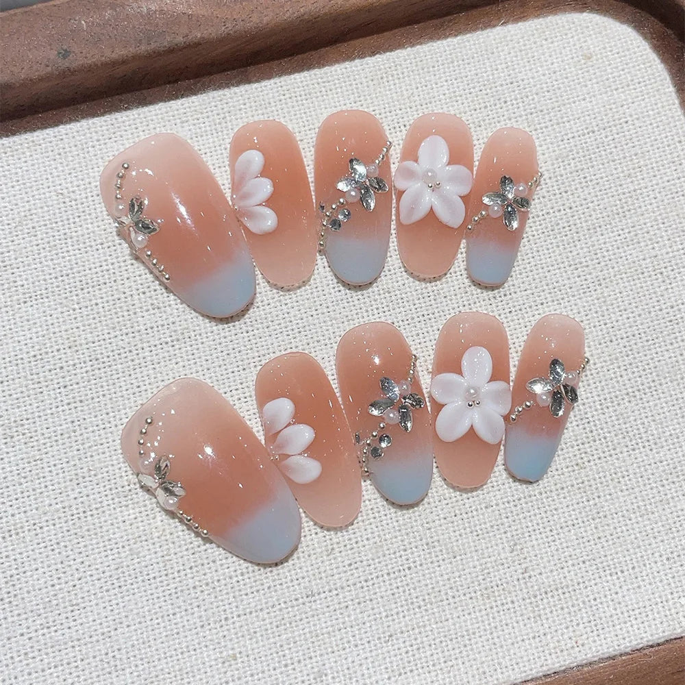 Faux ongles Ovales Pêche Fleur Étoile– Faits main (Lot de 10)