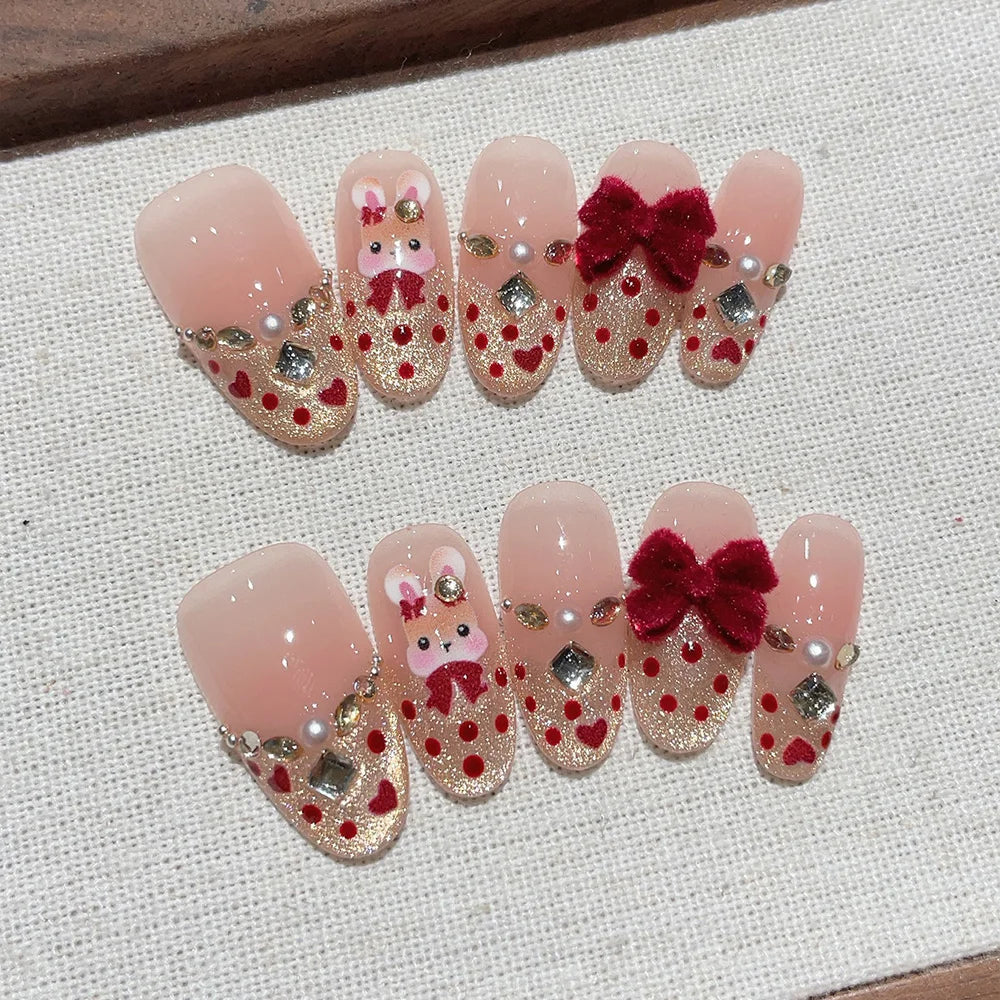 Faux ongles à pression en Amande - Nude Lapin Nœud Rouge Strass – Faits main (Lot de 10)