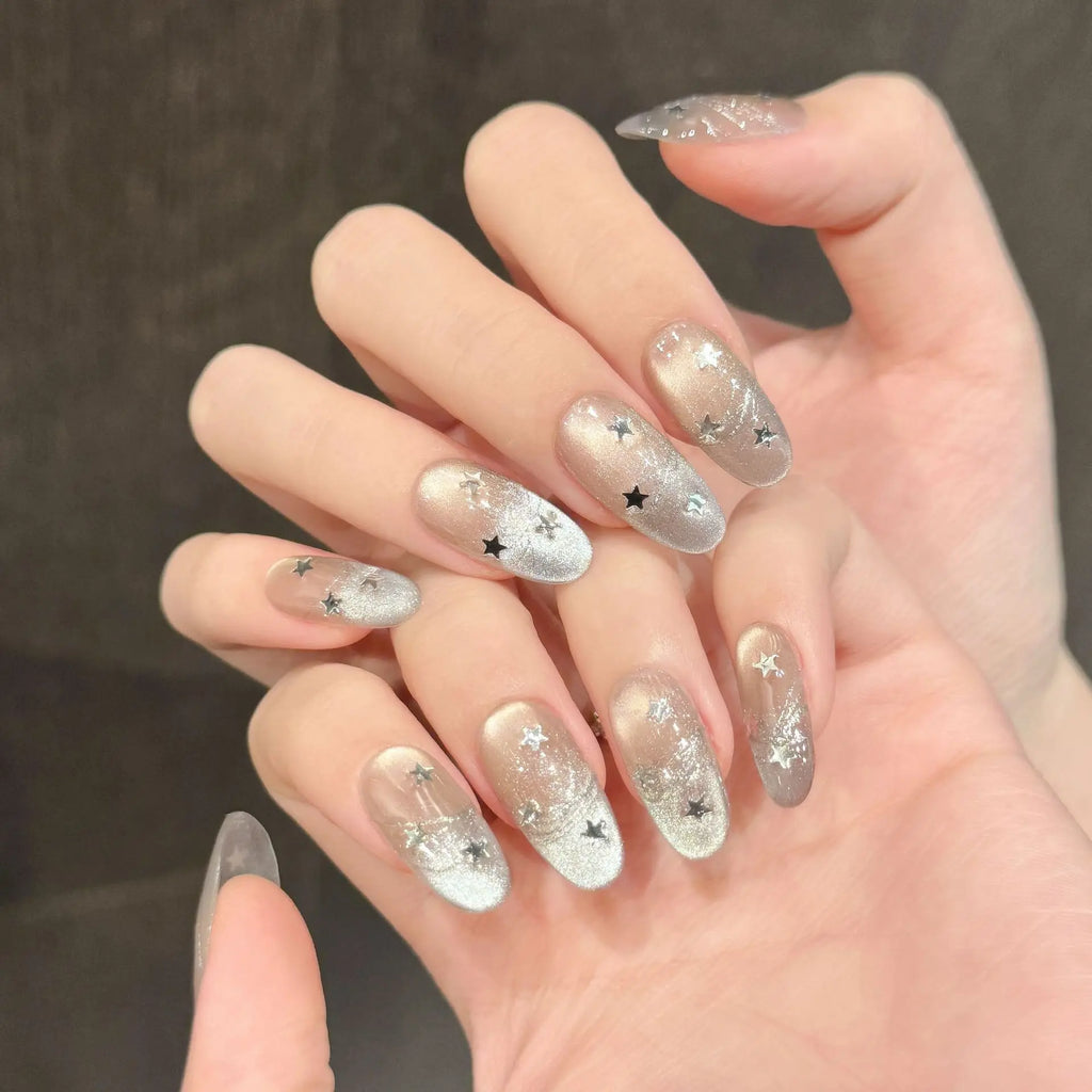 Faux ongles à pression Ovale Moyen Étoiles Œil de Chat Météore Froid - Faits main (Lot de 10)