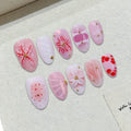 Faux ongles à pression Amande Moyen Rose Blanc Fleur Rouge Nœud Doré – Faits main (Lot de 10)