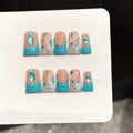 Faux ongles à pression Duck Moyen Bleu Lac French Diamant Fleurs Blanches 3D - Faits main (Lot de 10)